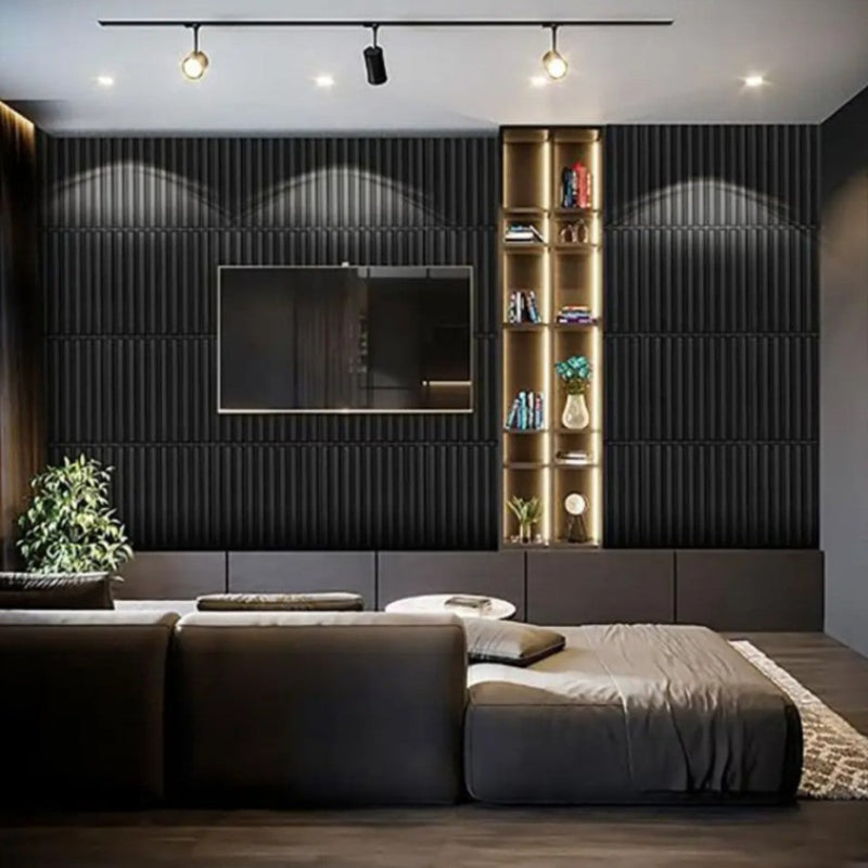 Modern living room with dark textured wall, bookshelf, and sofa.