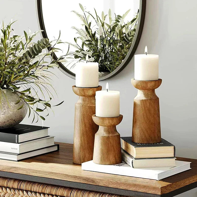 Rustic 3-piece wood candle holder set with natural finish, featuring varying heights for a tiered look; perfect for adding warmth and charm to living rooms, dining tables, or mantle decor.