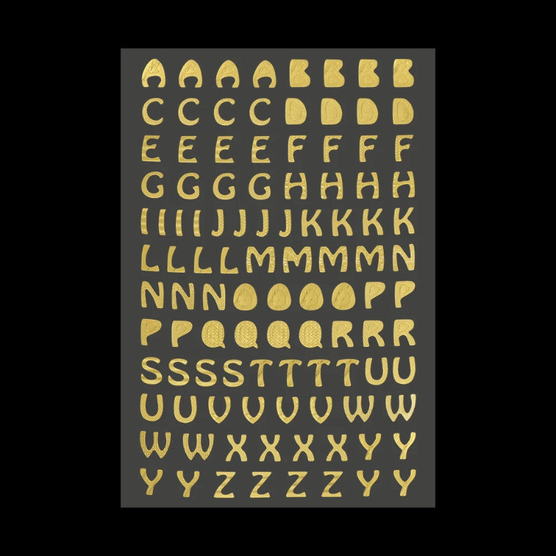 Sheet of gold alphabet stickers.
