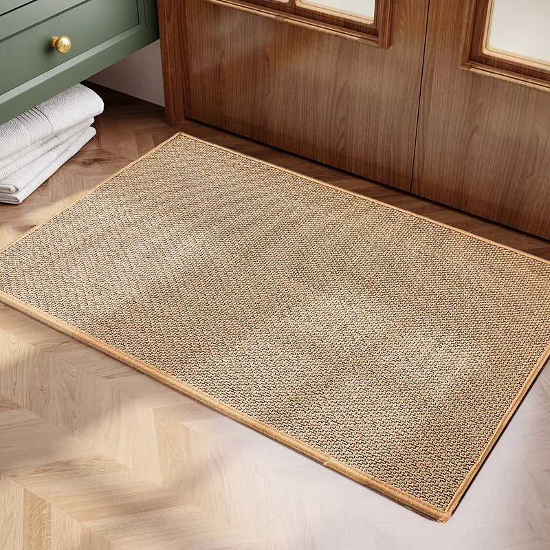 Woven mat on a wooden floor with a wooden cabinet in the background