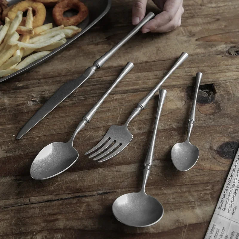 Set of rustic silverware on wood