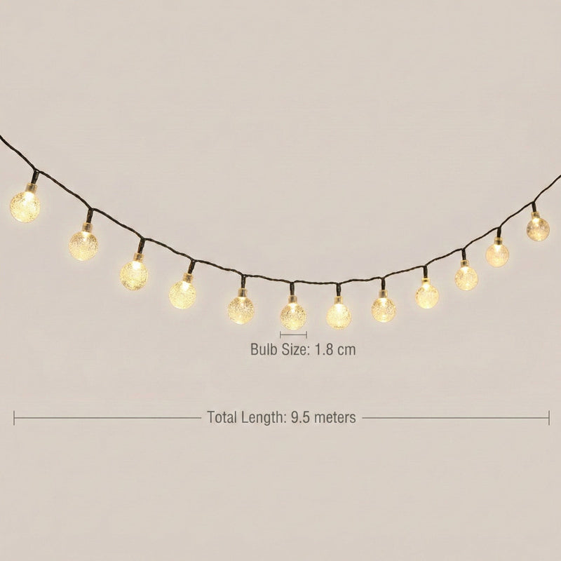 String of lights with bulb size and total length measurements on a plain background