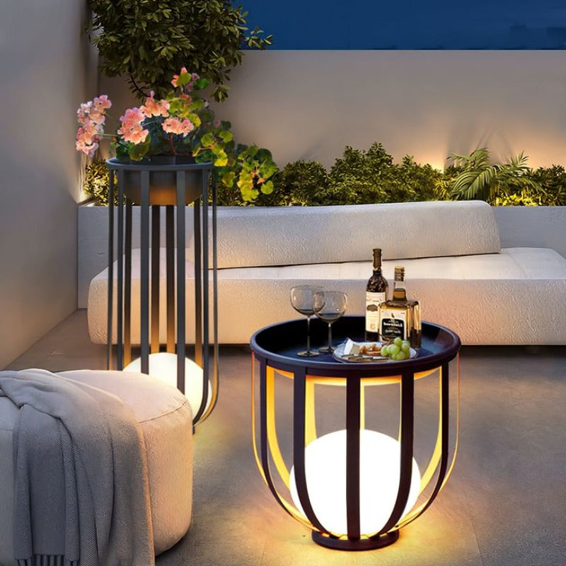 Solar table with built-in LED lights, powered by the sun to create a warm, inviting glow.