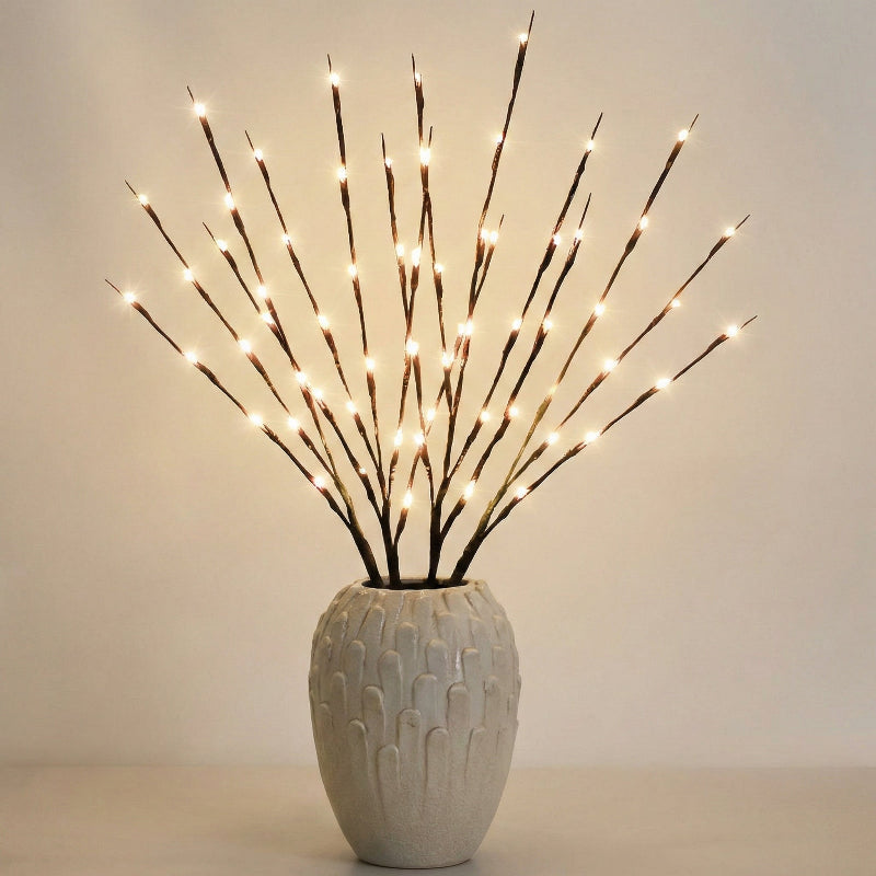 Decorative lamp with LED lights in a textured vase on a plain background