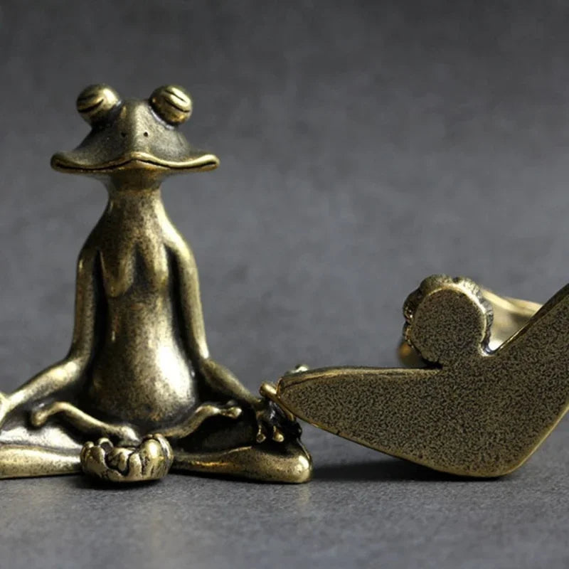 Zoomed-in view of the Zen frog incense holder, highlighting the precise slot for the incense stick placement.