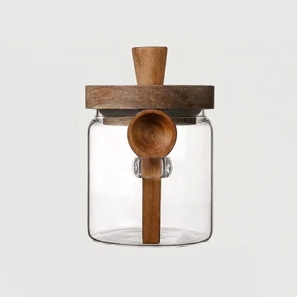 Single airtight glass jar with acacia lid and spoon on white background
