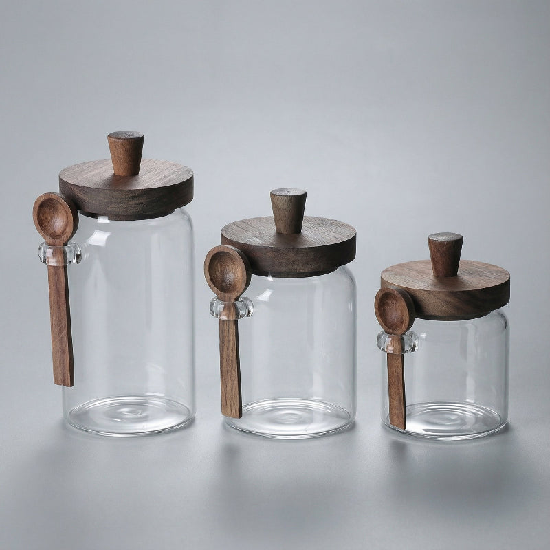 Minimal glass kitchen jars with airtight lids for modern pantry storage.