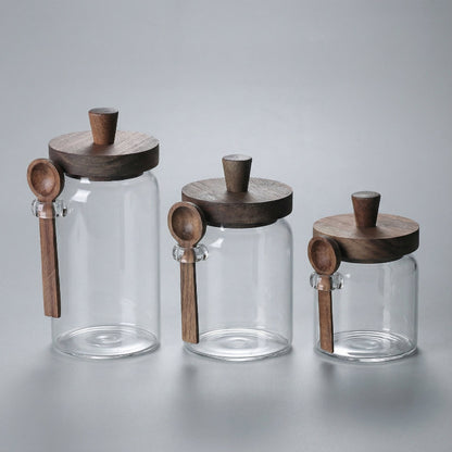 Minimal glass kitchen jars with airtight lids for modern pantry storage.