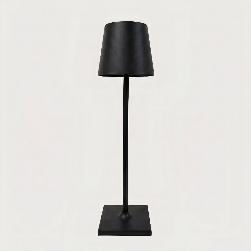 Allegra dimmable cordless table lamp in black on white background