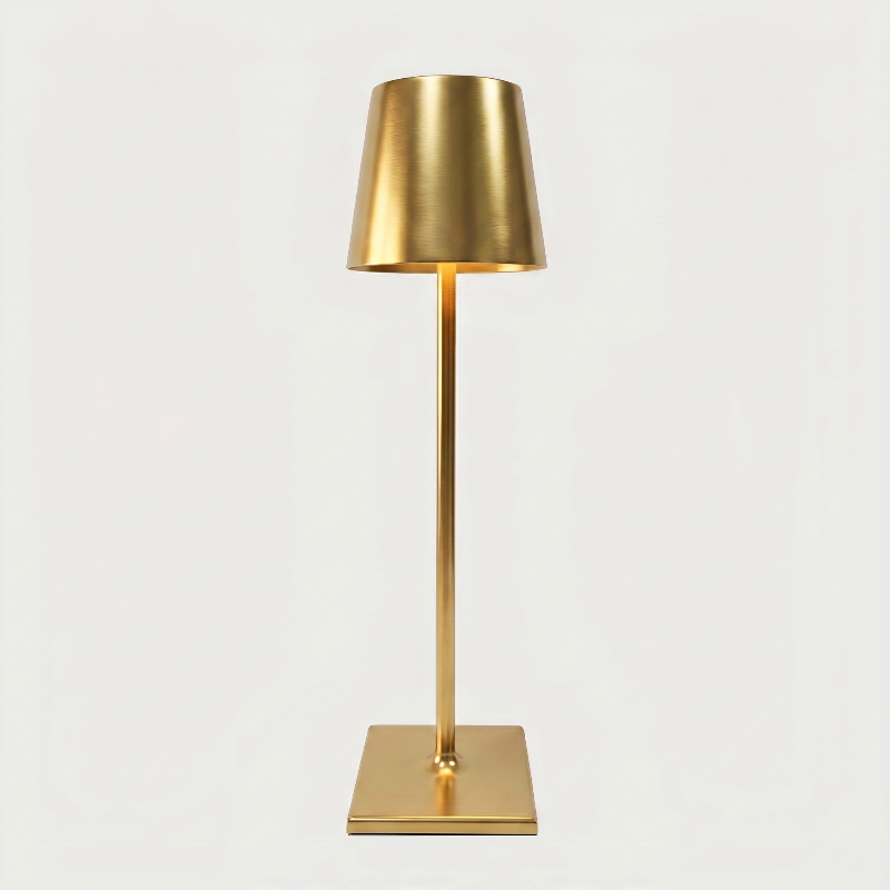 Allegra dimmable cordless table lamp in gold on white background