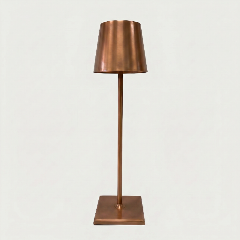 Allegra dimmable cordless table lamp in copper on white background