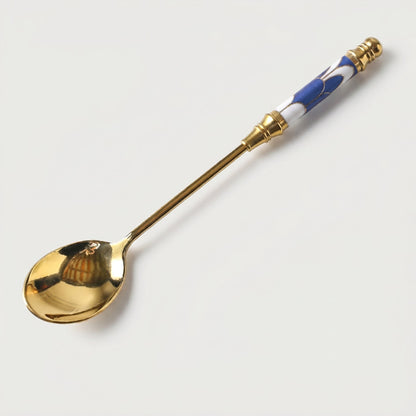 Blue Amalfi dessert spoon on white background