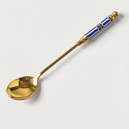 Blue Amalfi dessert spoon on white background