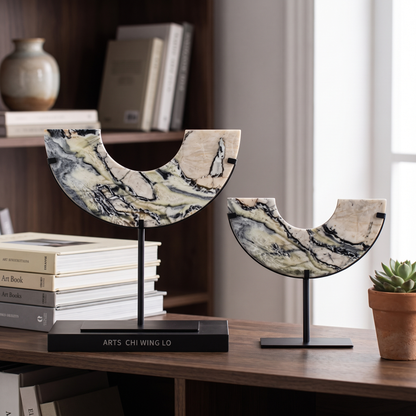 Arched Marble Sculptural Objects in both small and large sizes styled together on a modern shelf