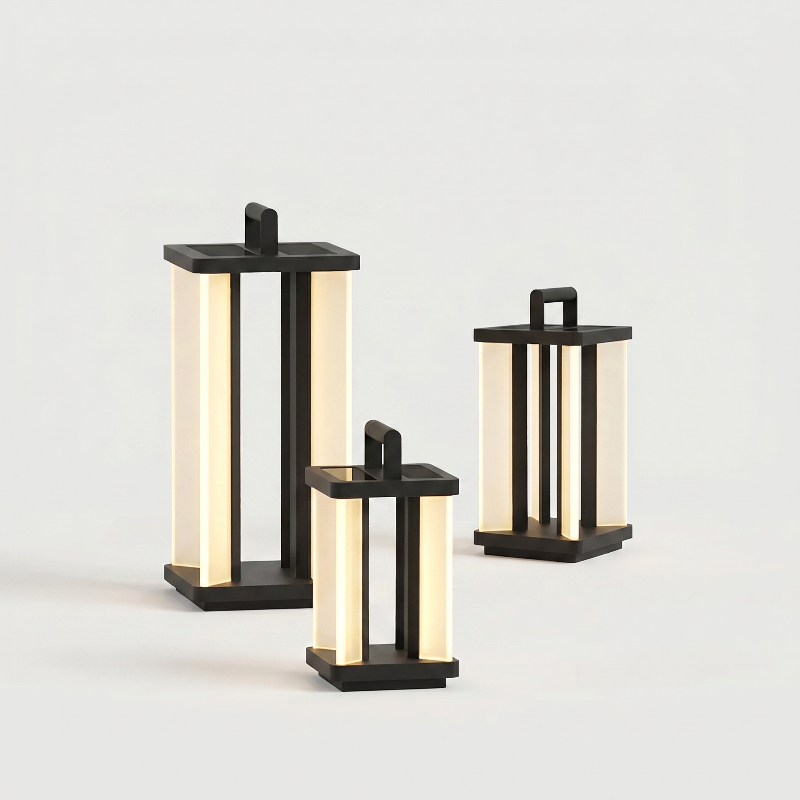 Architectural outdoor solar lanterns in three sizes on white background