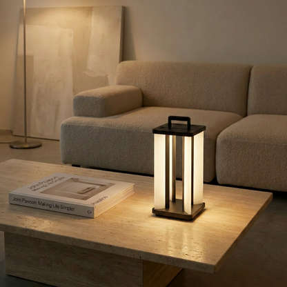 Architectural outdoor solar lantern on coffee table in bright living room