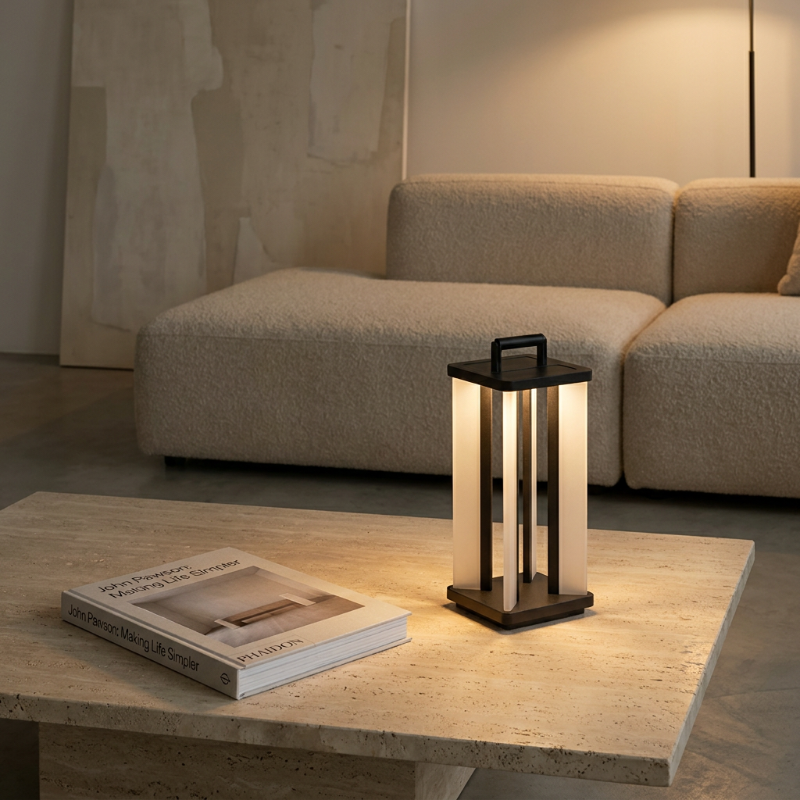 Architectural outdoor solar lantern on coffee table in neutral living room