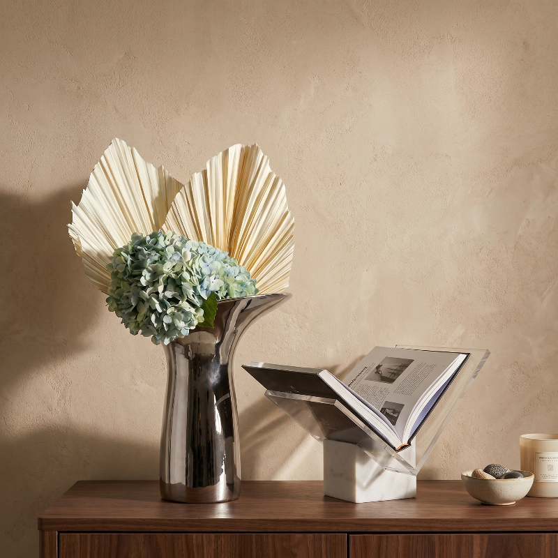 Aria marble and acrylic file holder styled with dried fan palm leaf