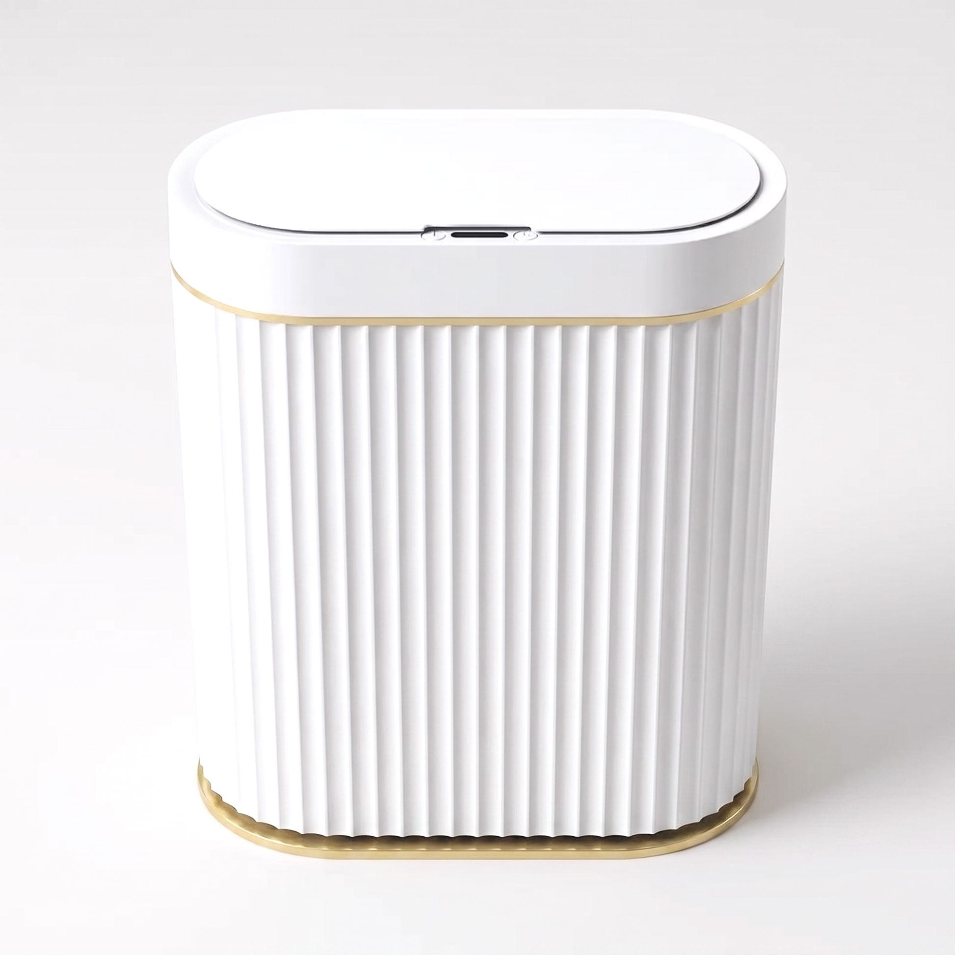 White ribbed automatic smart sensor trash can with gold trim and infrared sensor lid on a clean off-white background