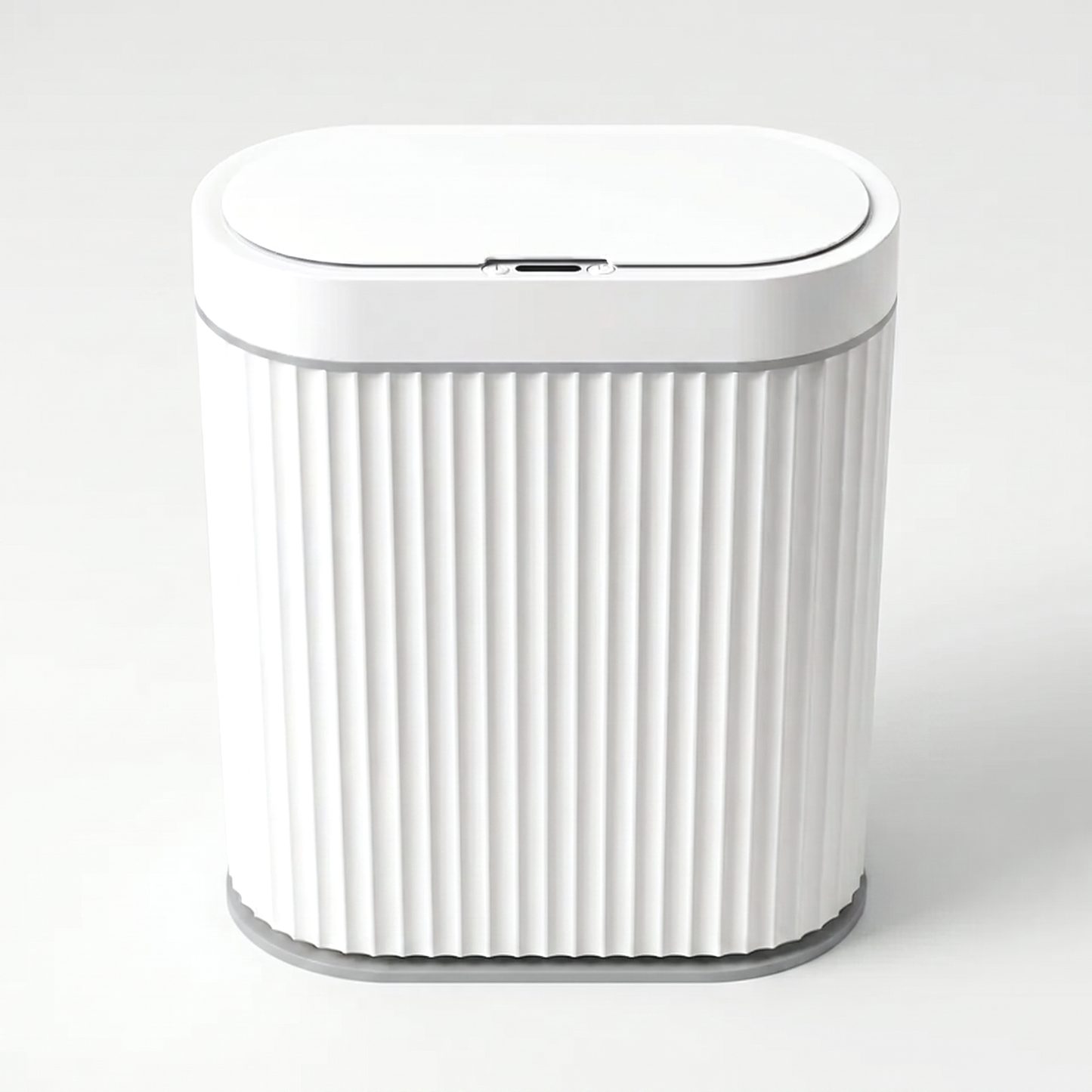 White ribbed automatic smart sensor trash can with grey trim and infrared sensor lid on a clean off-white background