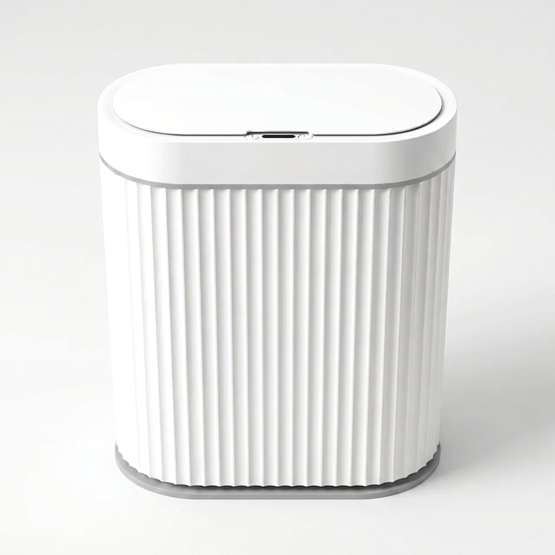 White ribbed automatic smart sensor trash can with grey trim and infrared sensor lid on a clean off-white background