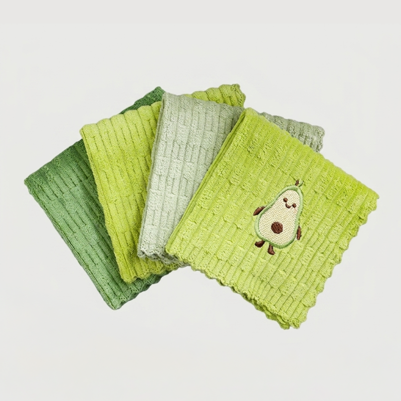 Avocado print dish towels stacked on white background