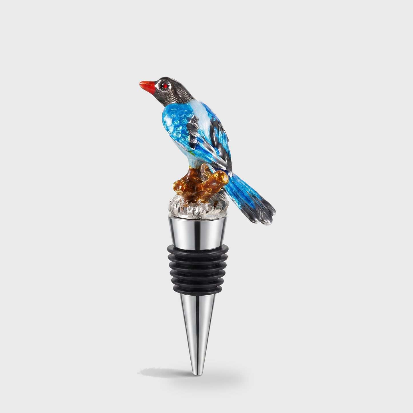 Magpie enamel bird wine bottle stopper with a silver finish on a clean off-white background