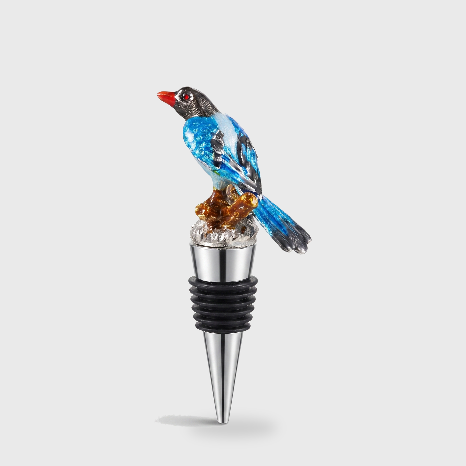 Magpie enamel bird wine bottle stopper with a silver finish on a clean off-white background