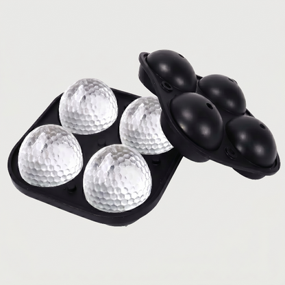 Black golf ball ice mold tray on white background with molded ice balls