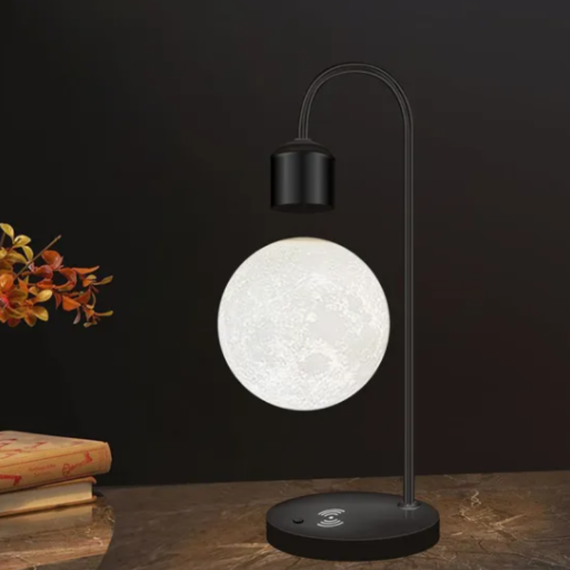 Sleek levitating wireless charger moon lamp, designed to float and glow, adding a touch of magic and practicality to your space.