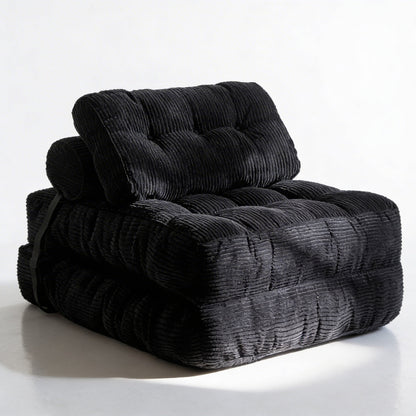 Black textured armchair on a white background