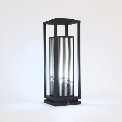 Black outdoor lamp with glass panel on a white background