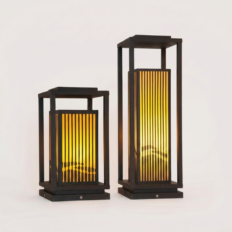 Black metal LED solar outdoor lanterns on white background