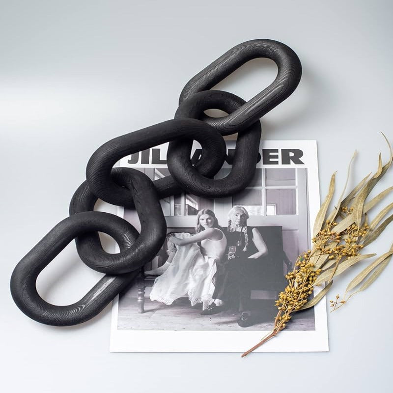 Decorative black wood chain with a sleek design, perfect for wall hanging or styling.