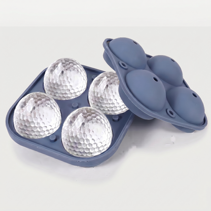 Blue golf ball ice mold tray on white background with molded ice balls