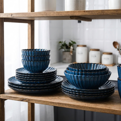 Blue ribbed ceramic dinnerware stacked on a kitchen shelf, Kiyo Home 22-piece set