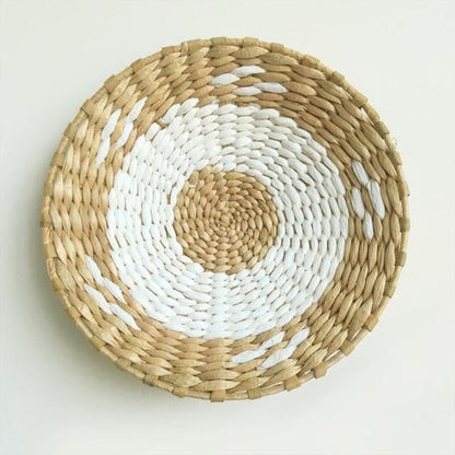 Charming boho woven wall baskets, ideal for adding warmth and texture to any room.