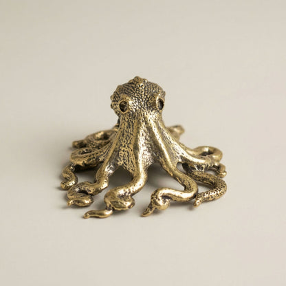 Brass octopus sculpture with antique polished finish