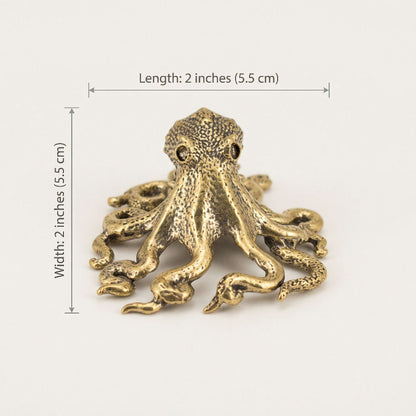 Bronze octopus figurine with dimensions on a white background