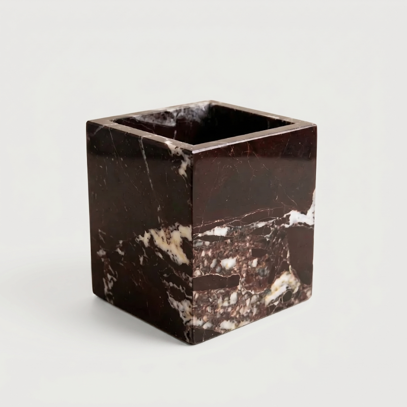 Calacatta black marble candle holder with a white background.