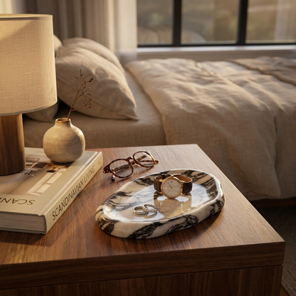 Calacatta marble tray on a bedside table with a lamp and glasses, Kiyo Home