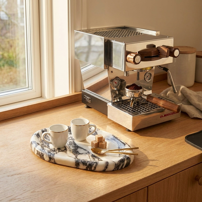 Calacatta marble tray at a coffee station holding espresso cups, Kiyo Home
