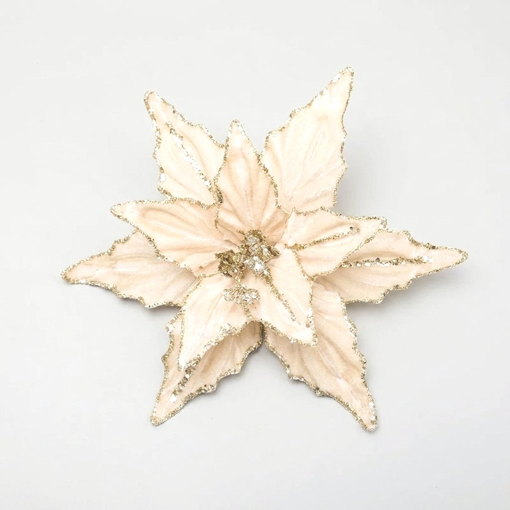 Champagne velvet poinsettia flower with gold glitter edges on a white background