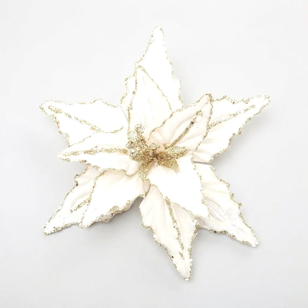 White poinsettia flower with gold glitter edges on a white background