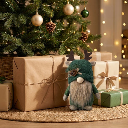 Green hat gnome under Christmas tree with kraft-wrapped gifts and gold ornaments