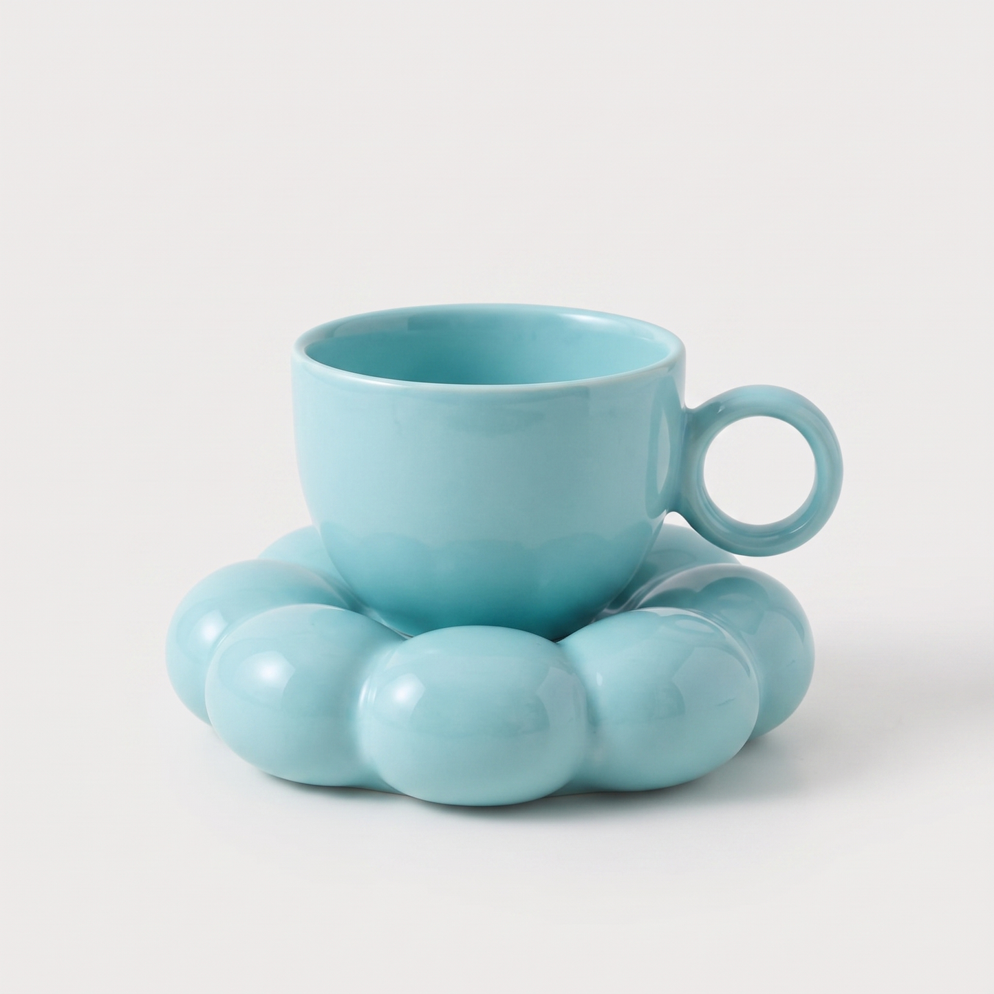 Blue ceramic coffee mug on a cloud-shaped saucer, Kiyo Home cloud saucer mug set