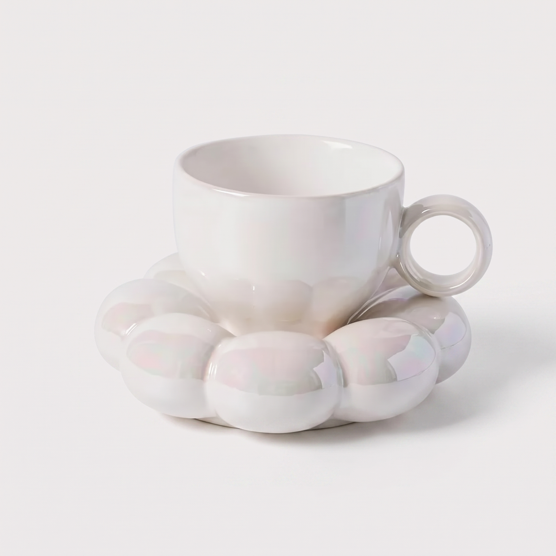Pearl-white ceramic coffee mug on a cloud-shaped saucer, Kiyo Home cloud saucer mug set