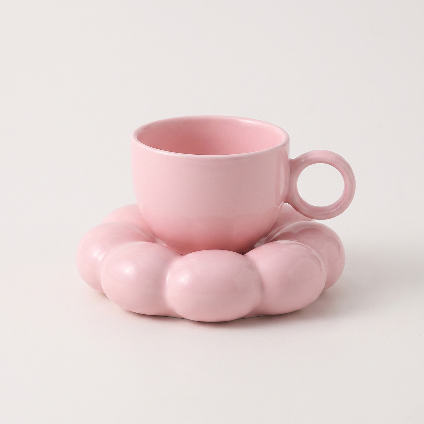 Light pink ceramic coffee mug on a cloud-shaped saucer, Kiyo Home cloud saucer mug set
