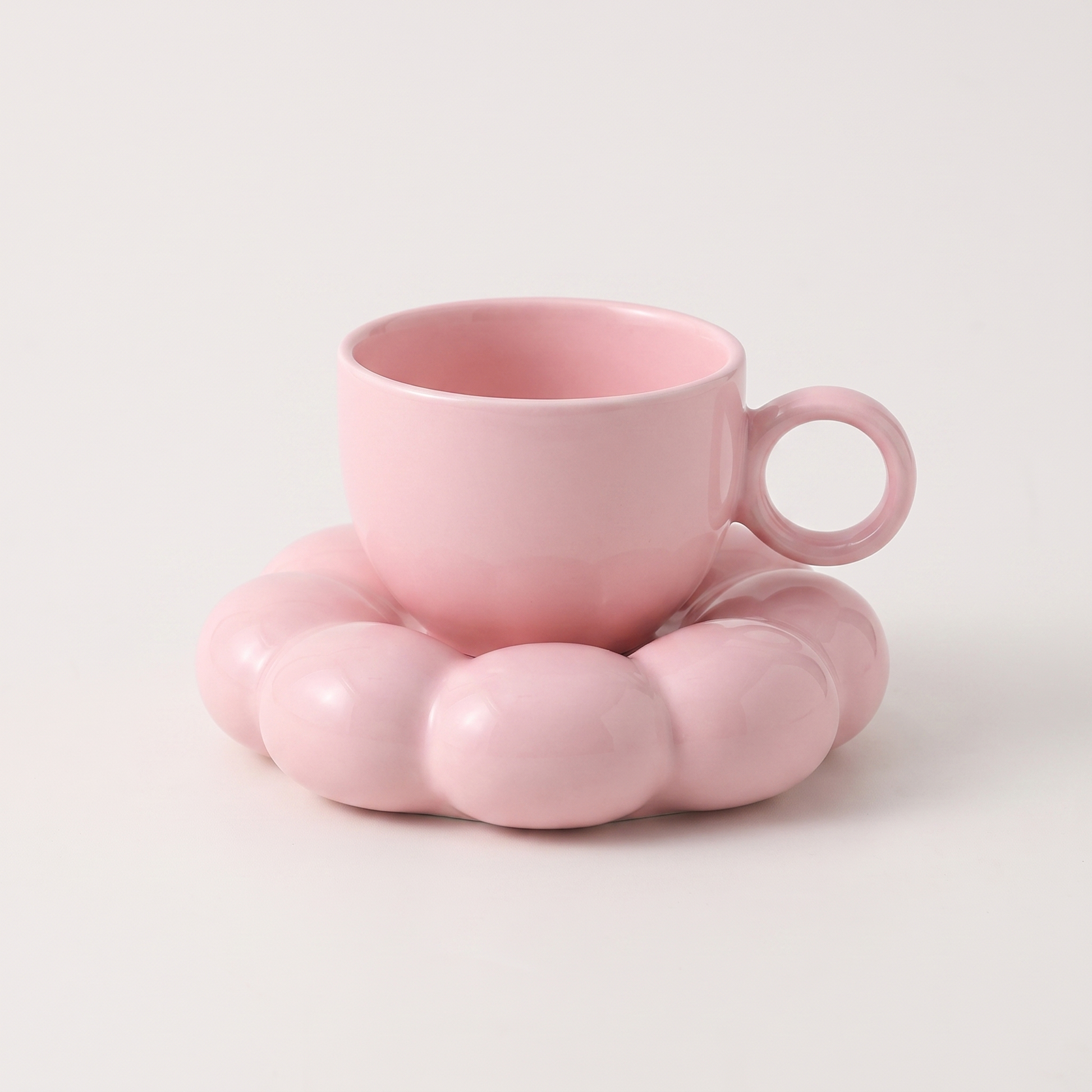 Light pink ceramic coffee mug on a cloud-shaped saucer, Kiyo Home cloud saucer mug set