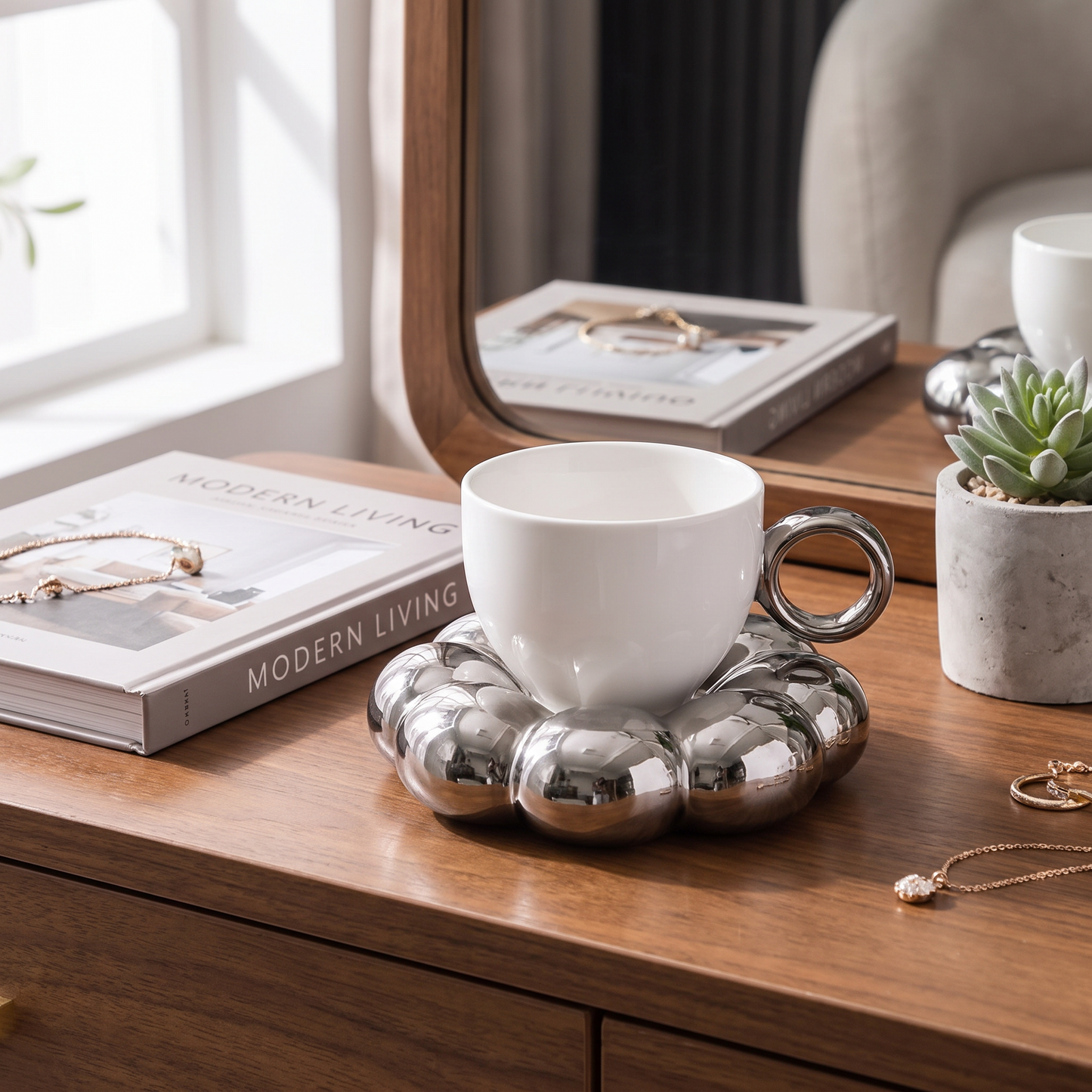 Silver cloud saucer coffee mug styled on a desk with books, Kiyo Home